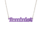 Parma violet Feminist necklace shown hanging on a white background. 