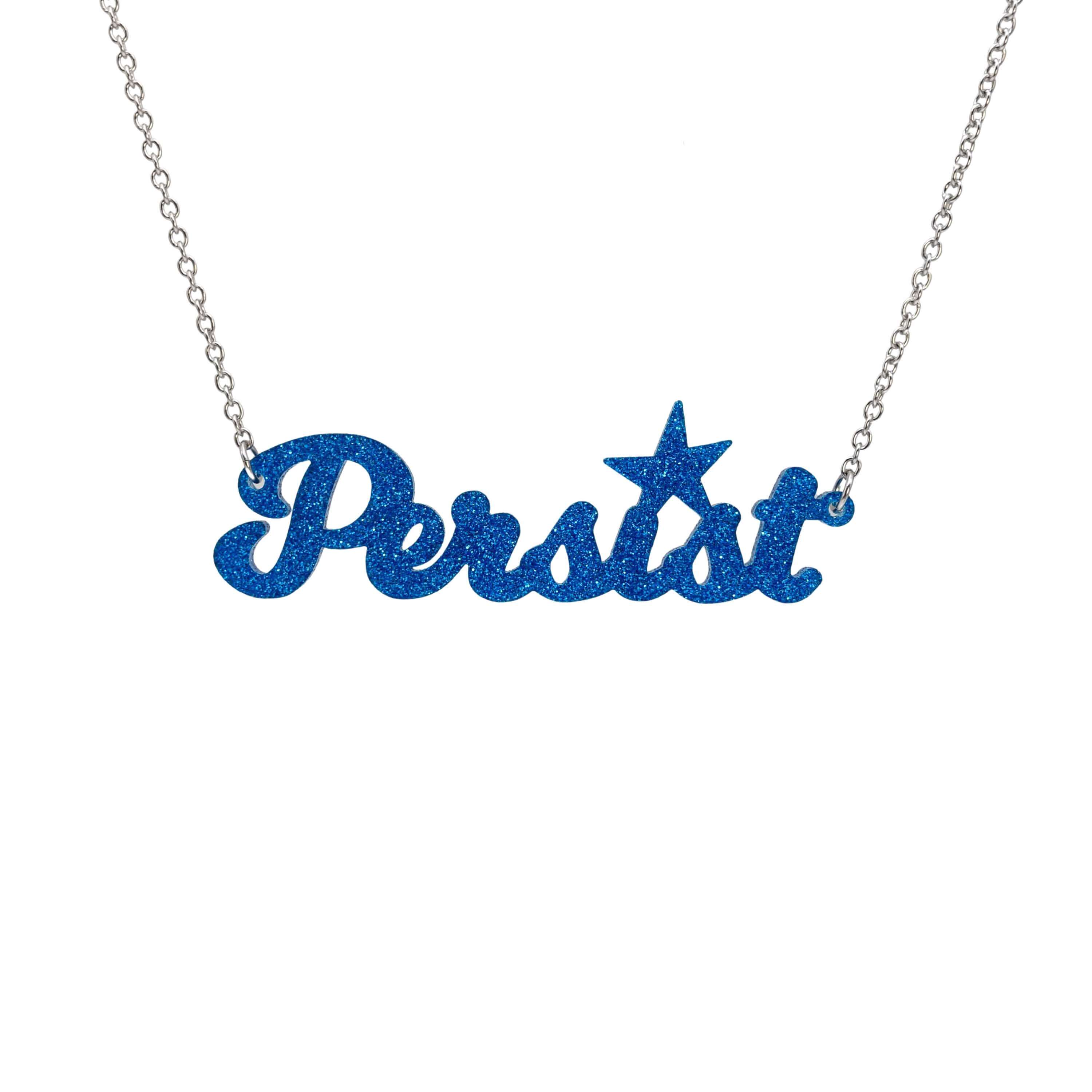 Persist necklaace in blue glitter, shown hanging against a white background. 