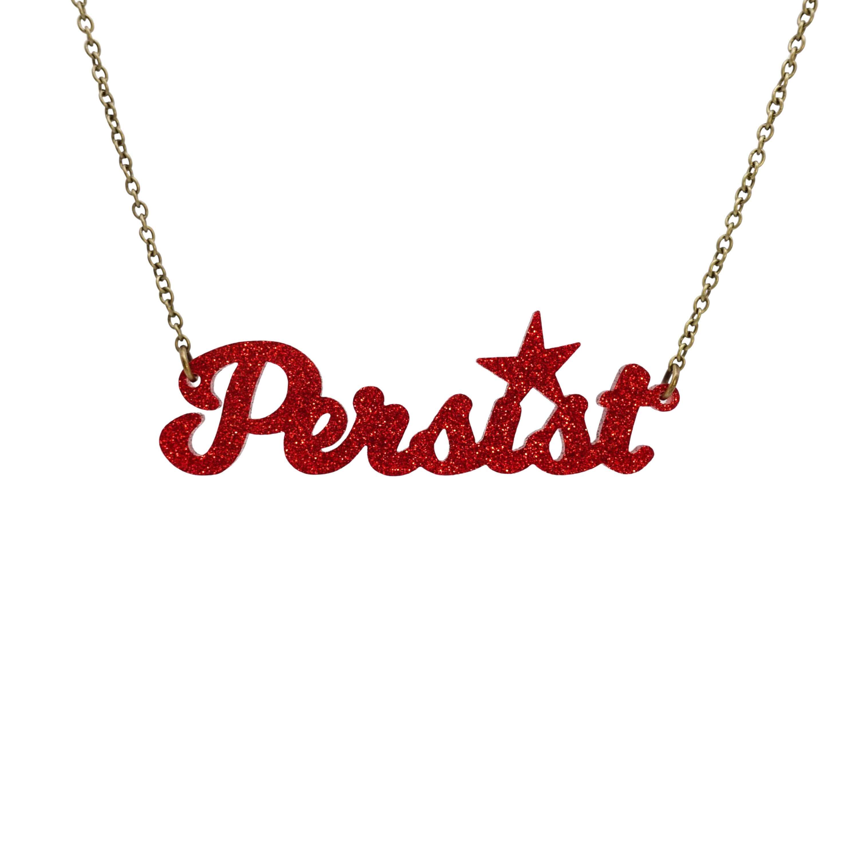Persist necklaace in red glitter, shown hanging against a white background. 