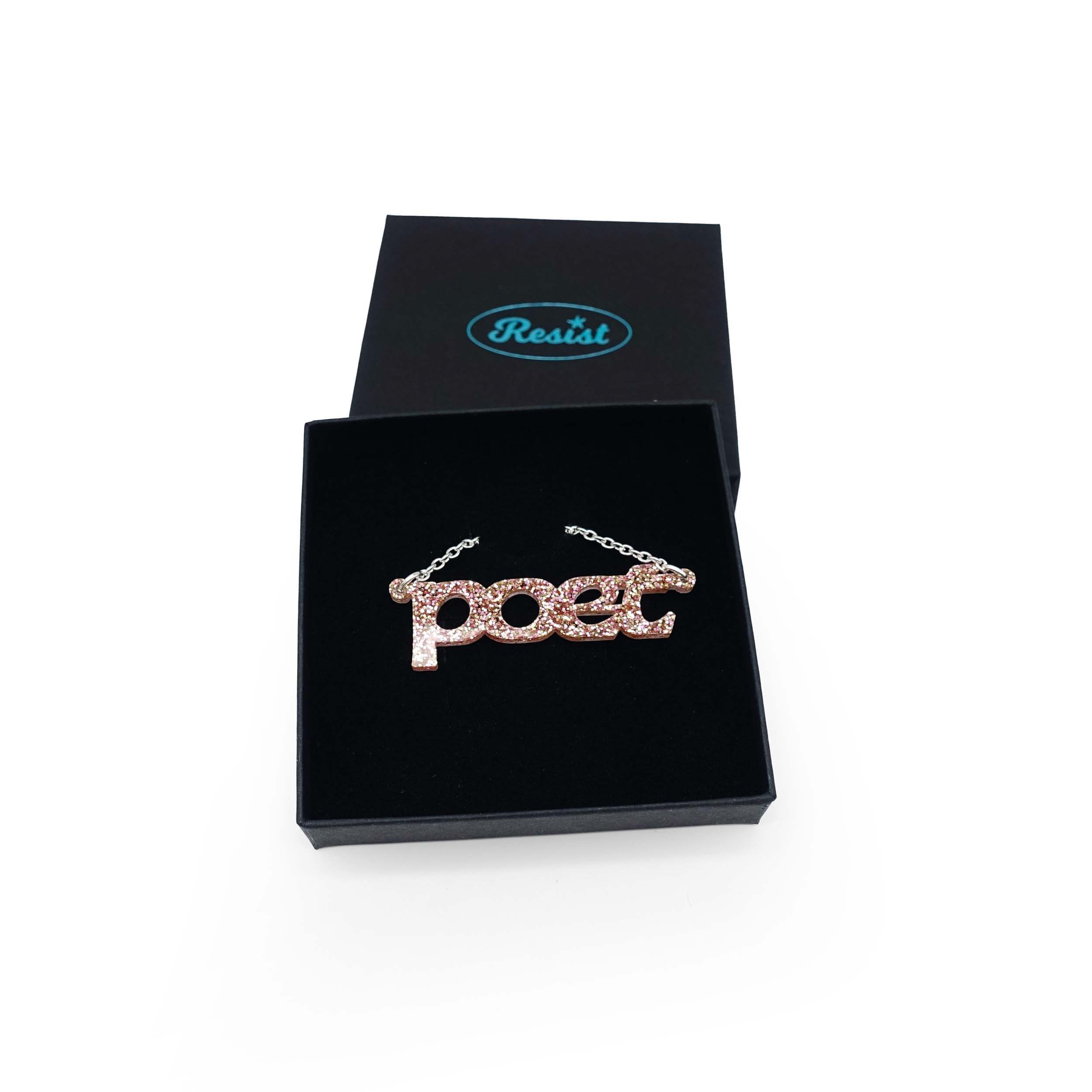 Poet necklace in pink fizz glitter, shown in a Wear and Resist gift box.