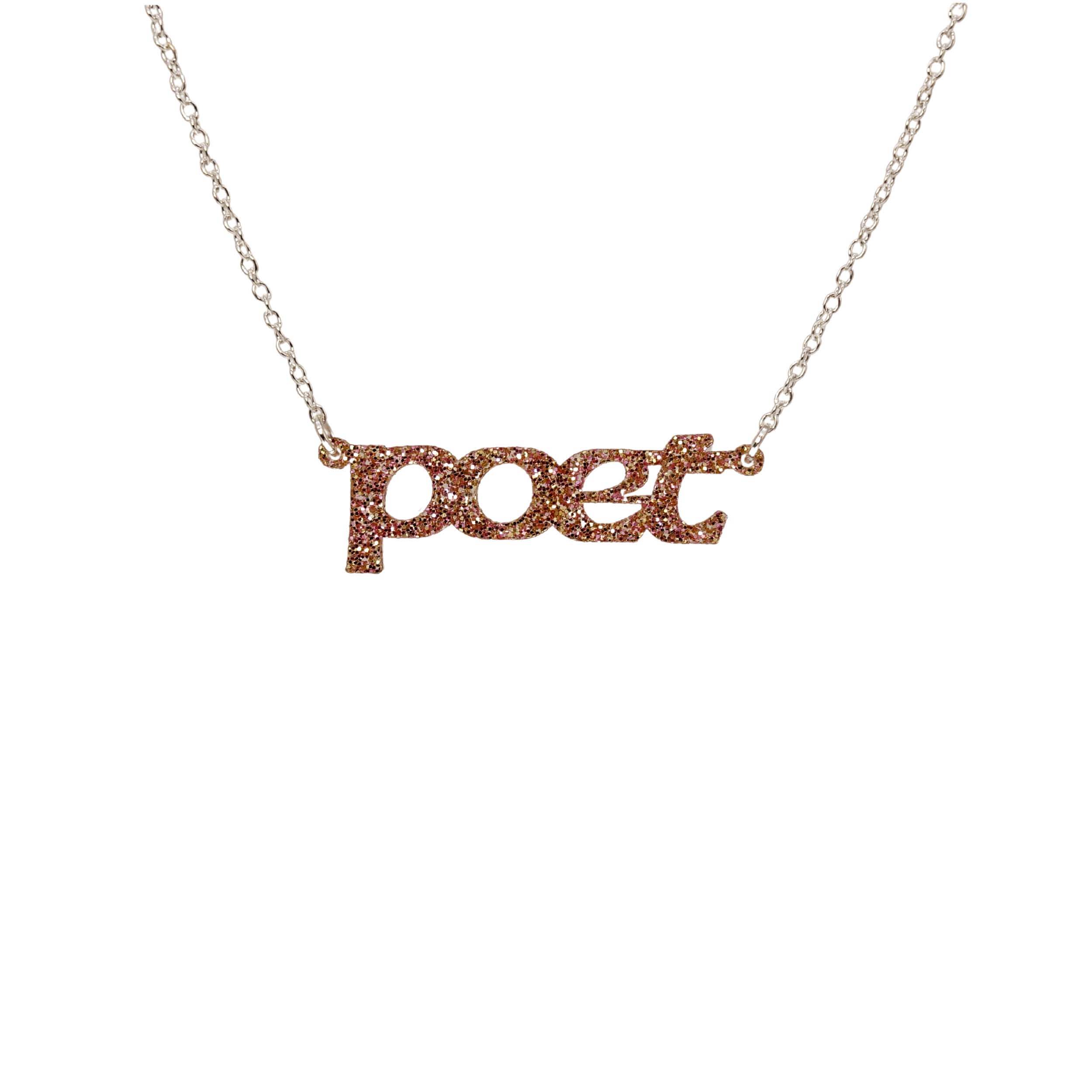 Poet necklace in pink fizz glitter, shown hanging against a white background. 