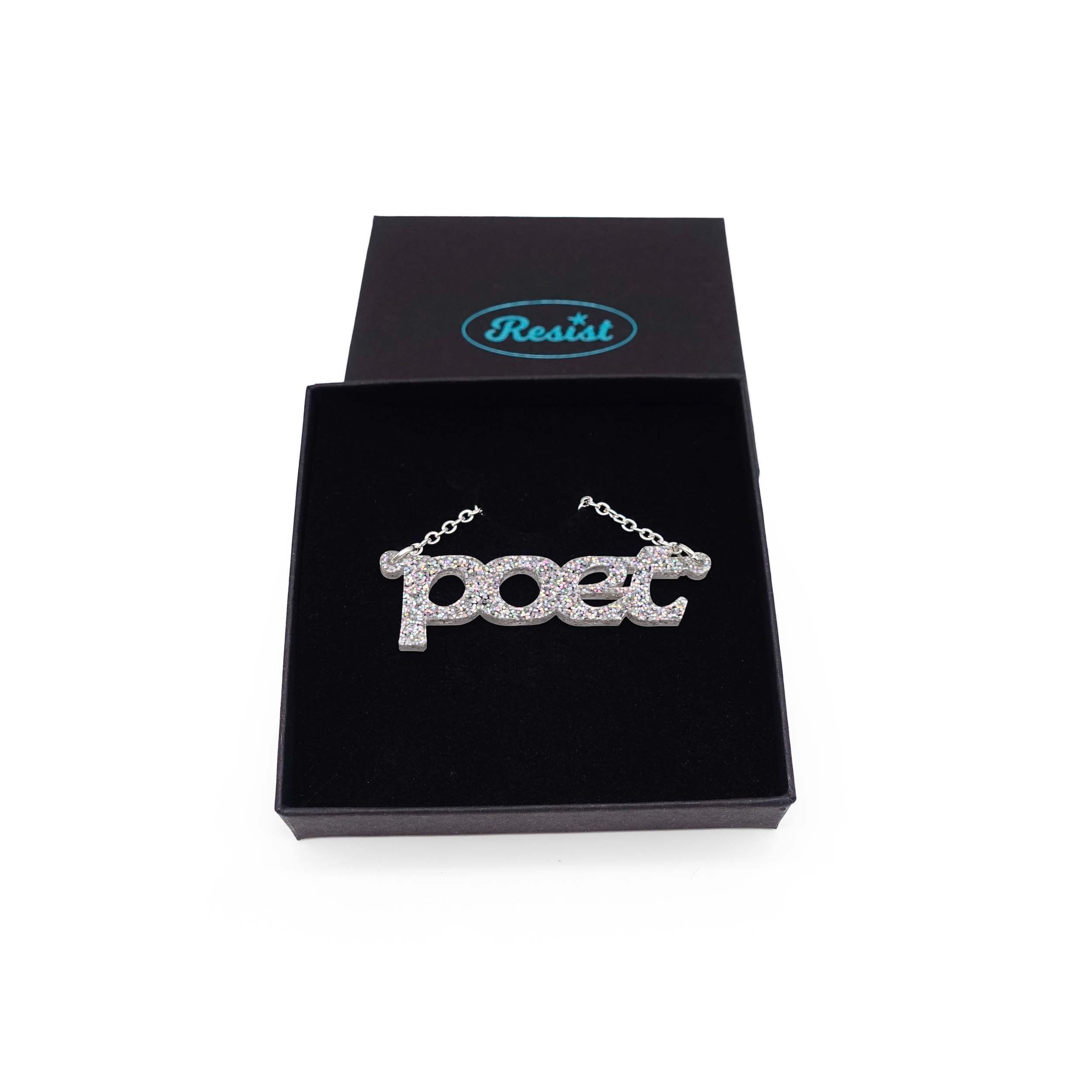 Poet necklace in silver glitter, shown in a Wear and Resist gift box. 