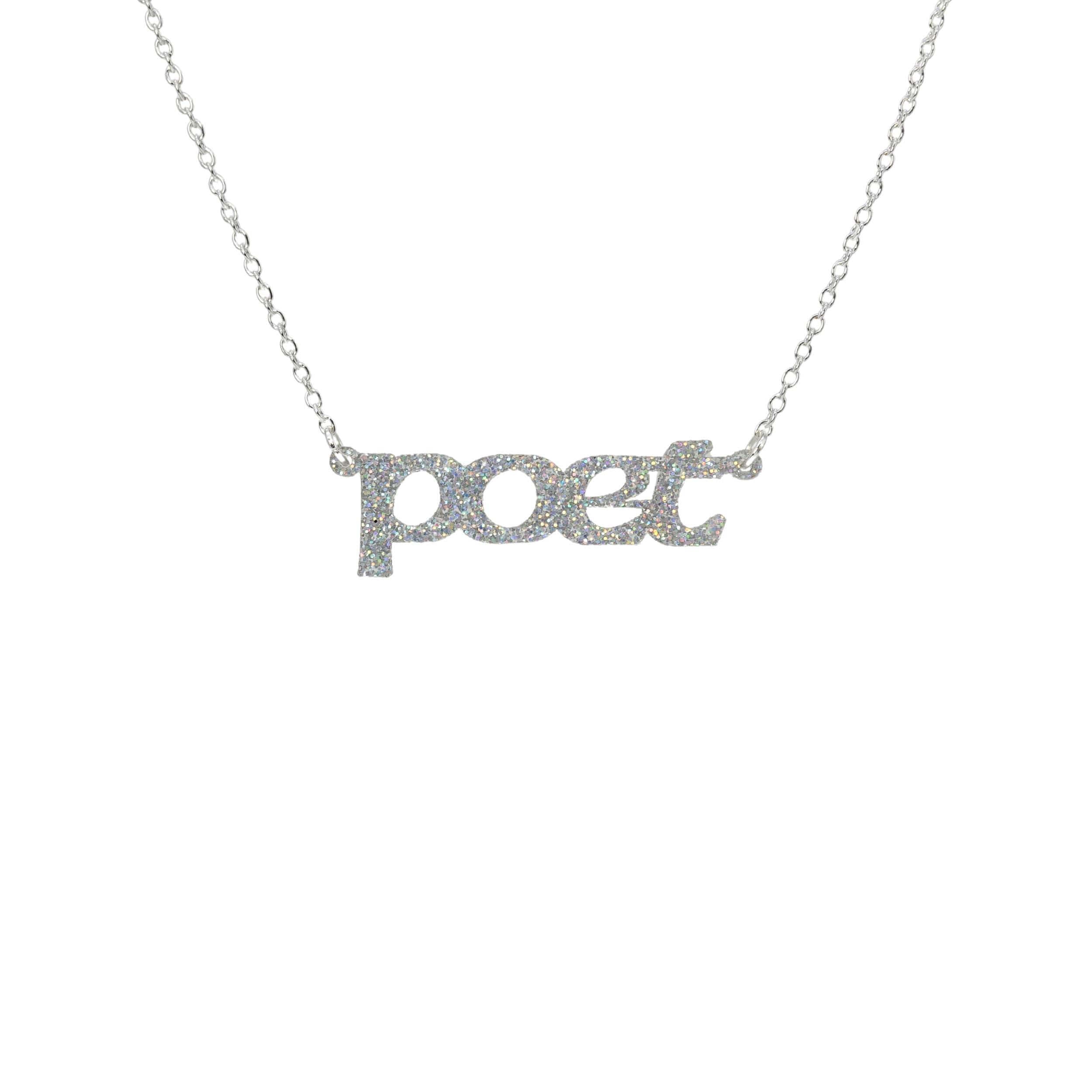 Poet necklace in silver glitter, shown hanging against a white background. 