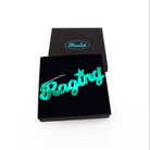 Electric green Raging necklace shown in a Wear and Resist gift box.