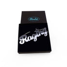 Slate mirror Raging necklace shown in a Wear and Resist gift box.