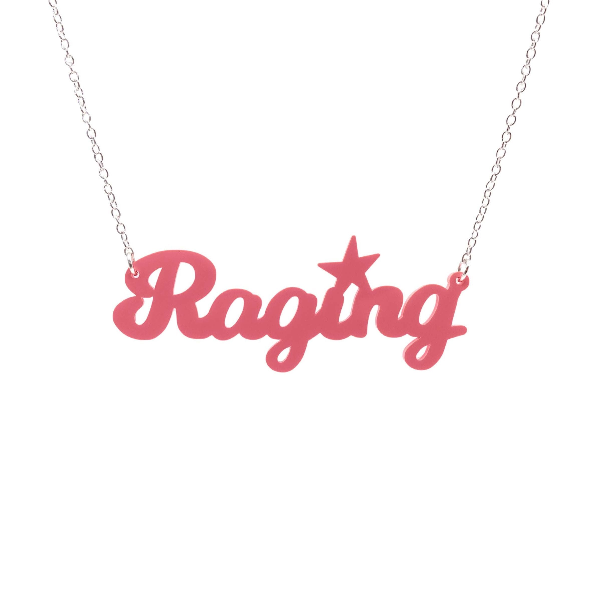 Raging necklace in sunset pink, hanging against a white background.