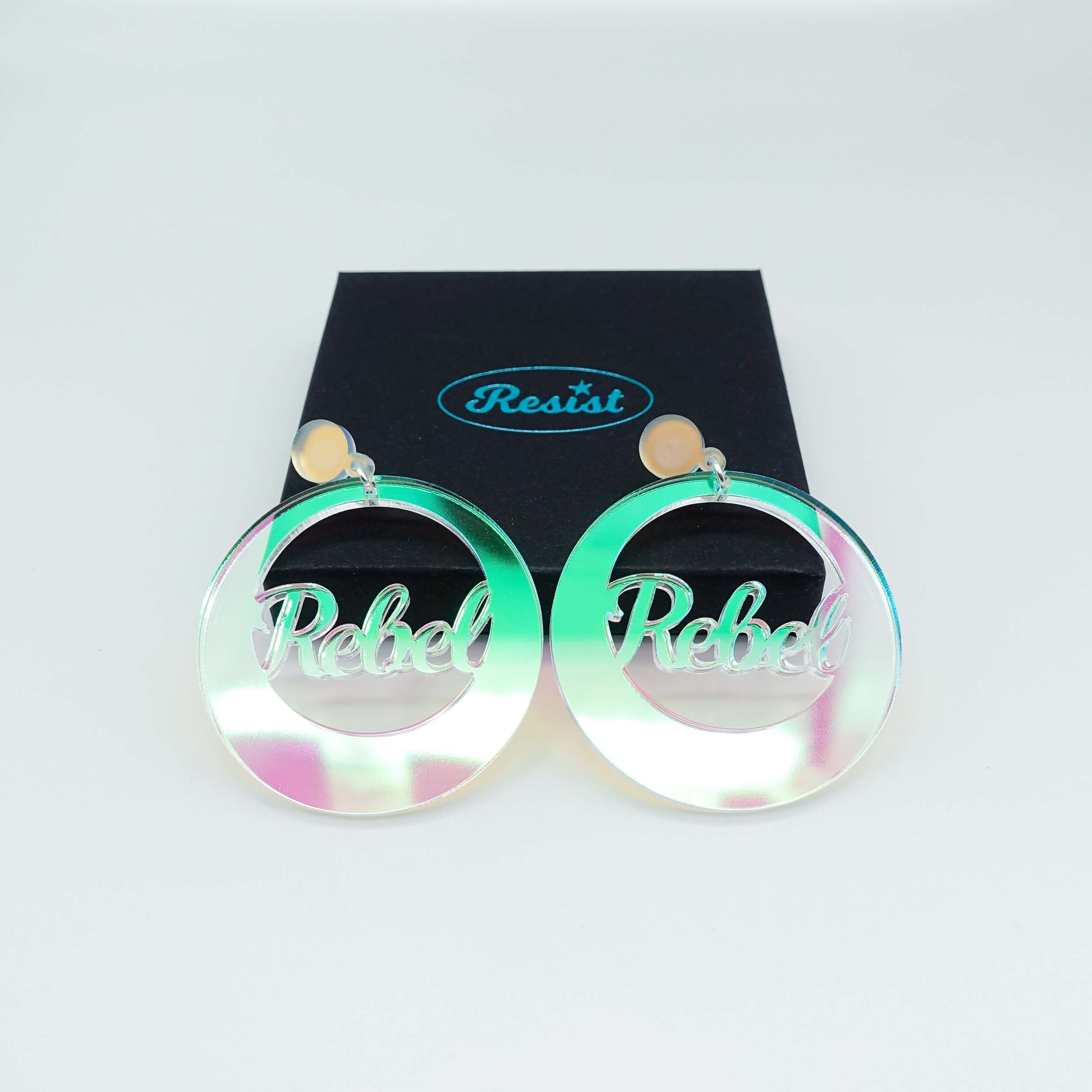 Rebel Rebel earrings for Bowie lovers in iridescent acrylic. Shown with a Wear and Resist gift box. 