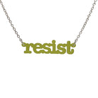 Typewriter Resist necklace in olive frost shown hanging on a stainless steel chain against a white background. 