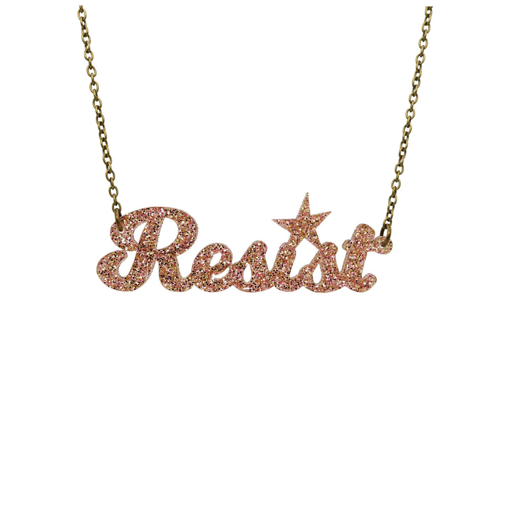 Script resist necklace in pink fizz glitter, shown hanging against a white background.