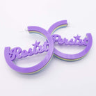 Suffragette Trio Resist and Persist statement hoops in Parma violet. 