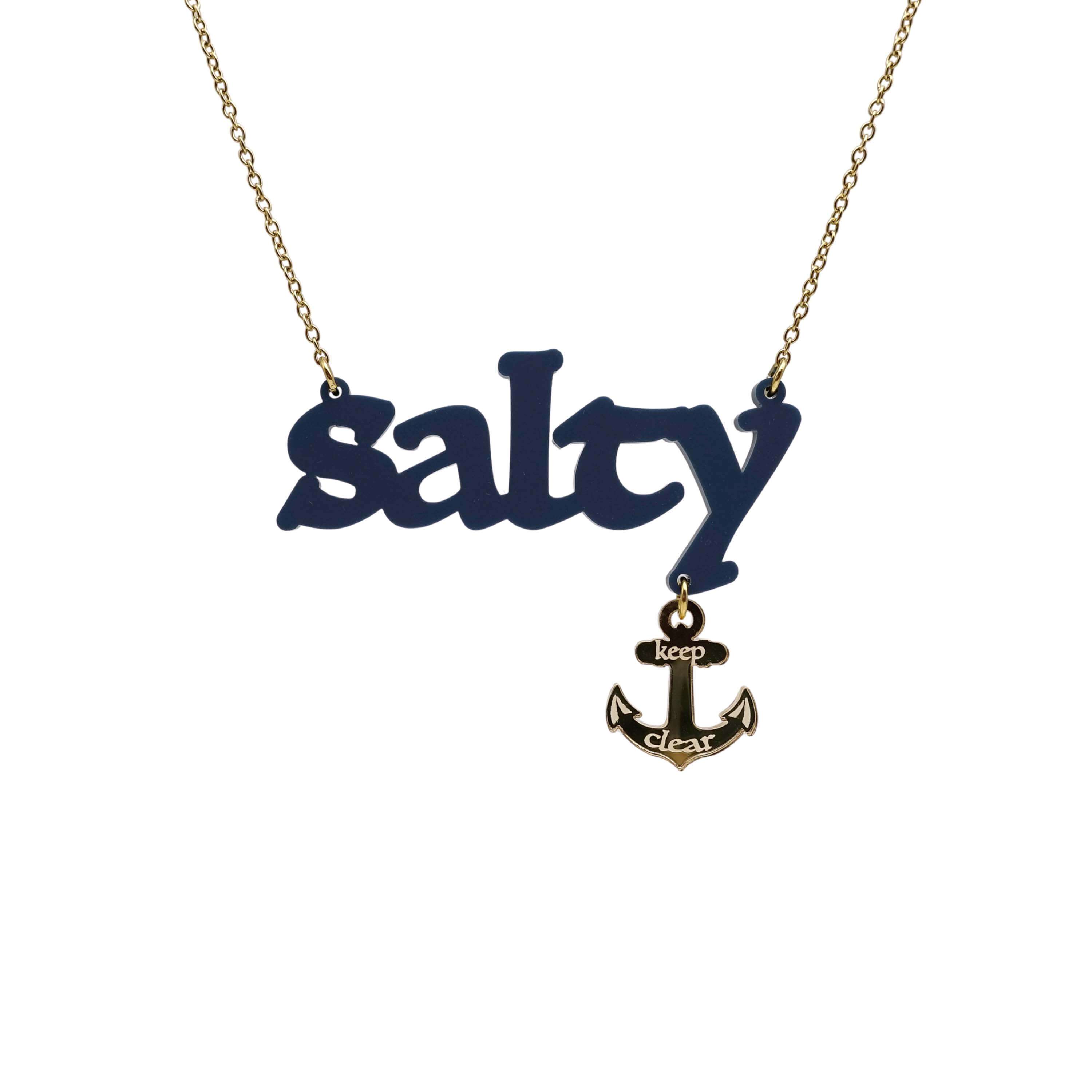 Salty necklace with an etched anchor that says 'keep clear' shown on a gold-plated stainless steel chain hanging on a white background. 