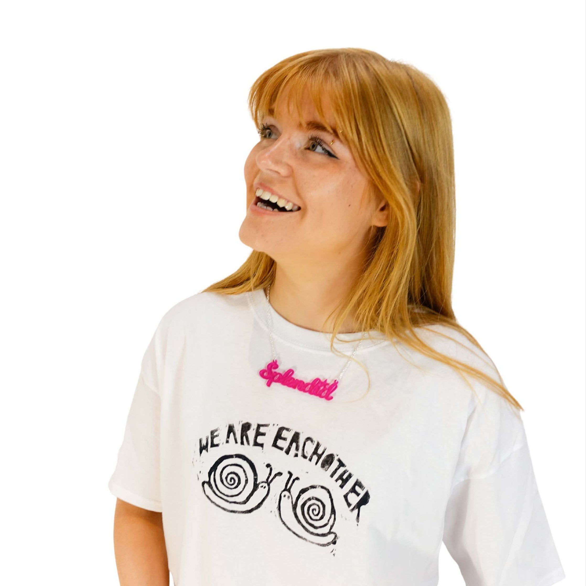 Eliza wears a Splendid necklace in neon pink. 