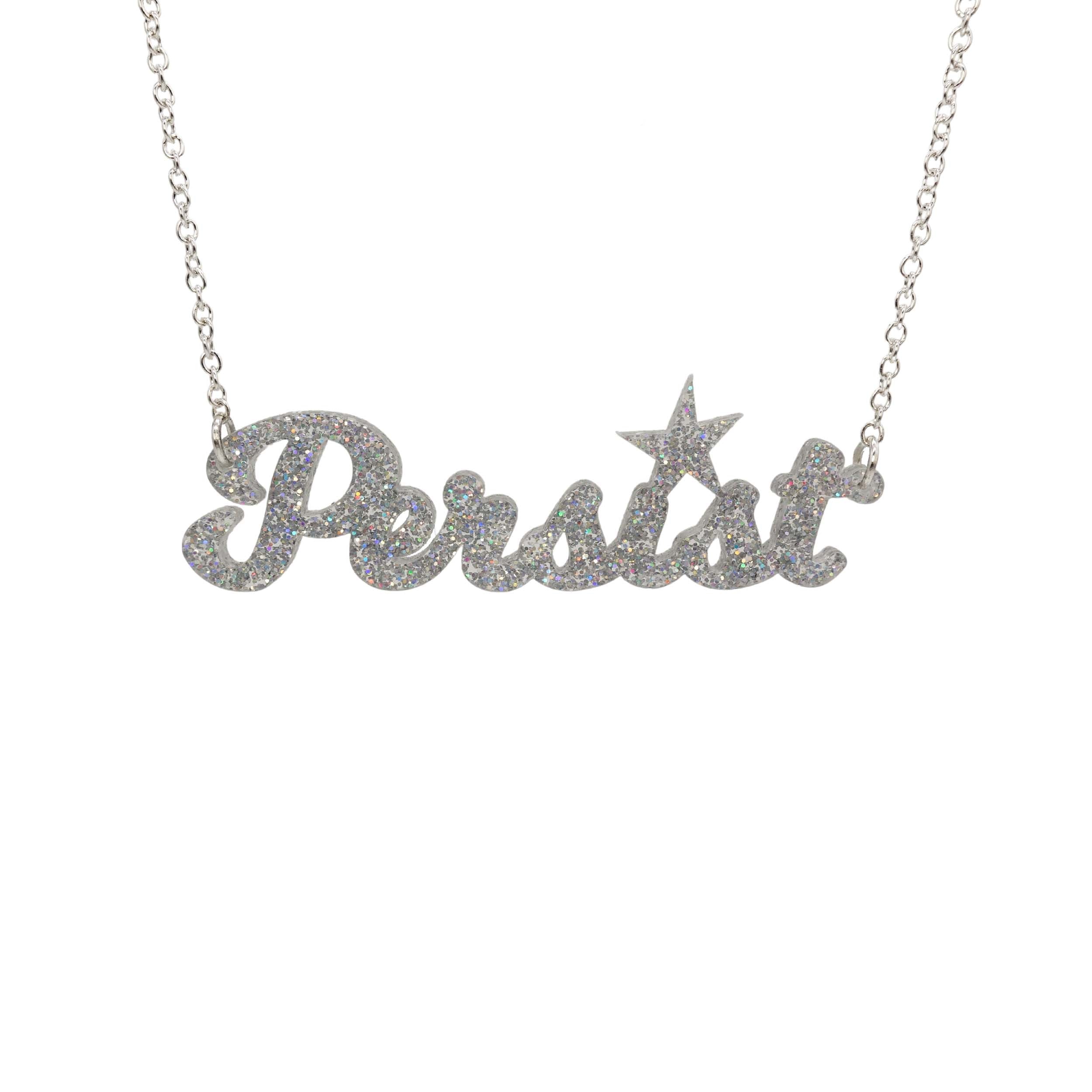 Silver glitter script Persist necklace shown hanging against a white background. 