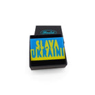 Slava Ukraini brooch or pin to show your support for Ukraine. Shown in a small Wear and Resist gift box. F*ck Trump! They were invaded by Russia, and we know the facts. 