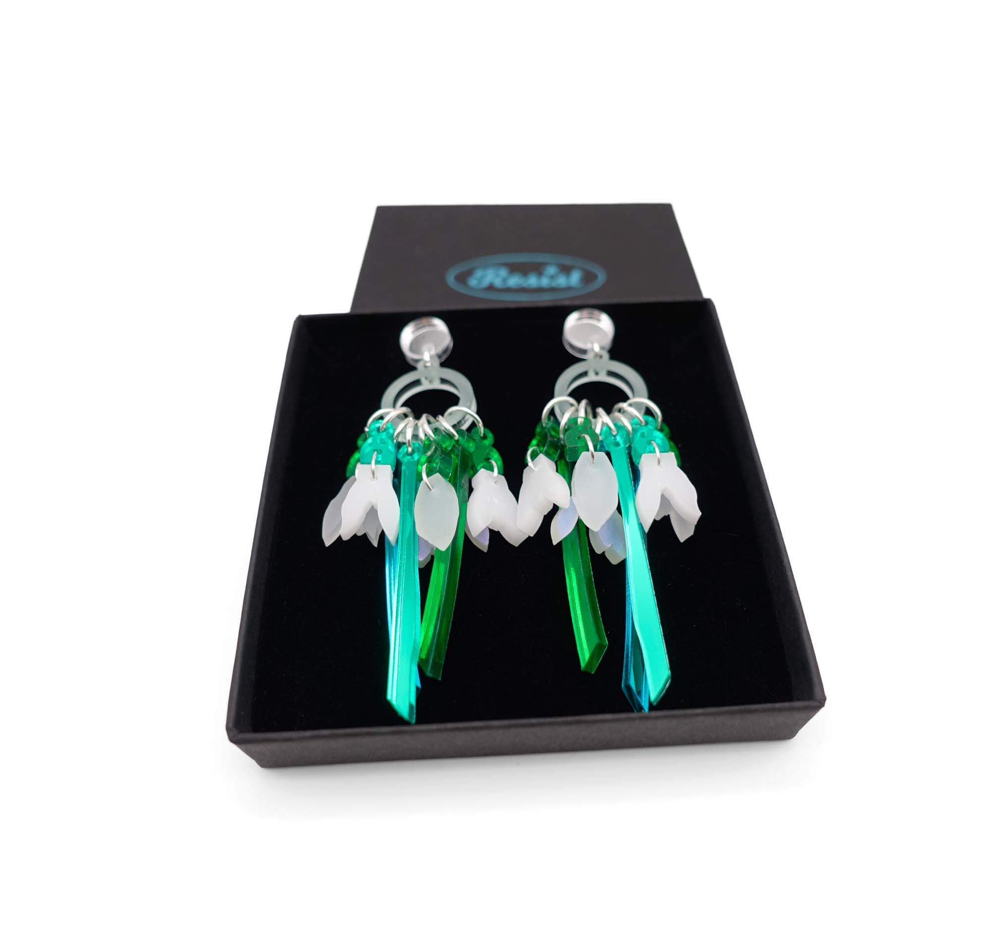 Snowdrop earrings shown in a Wear and Resist gift box. 