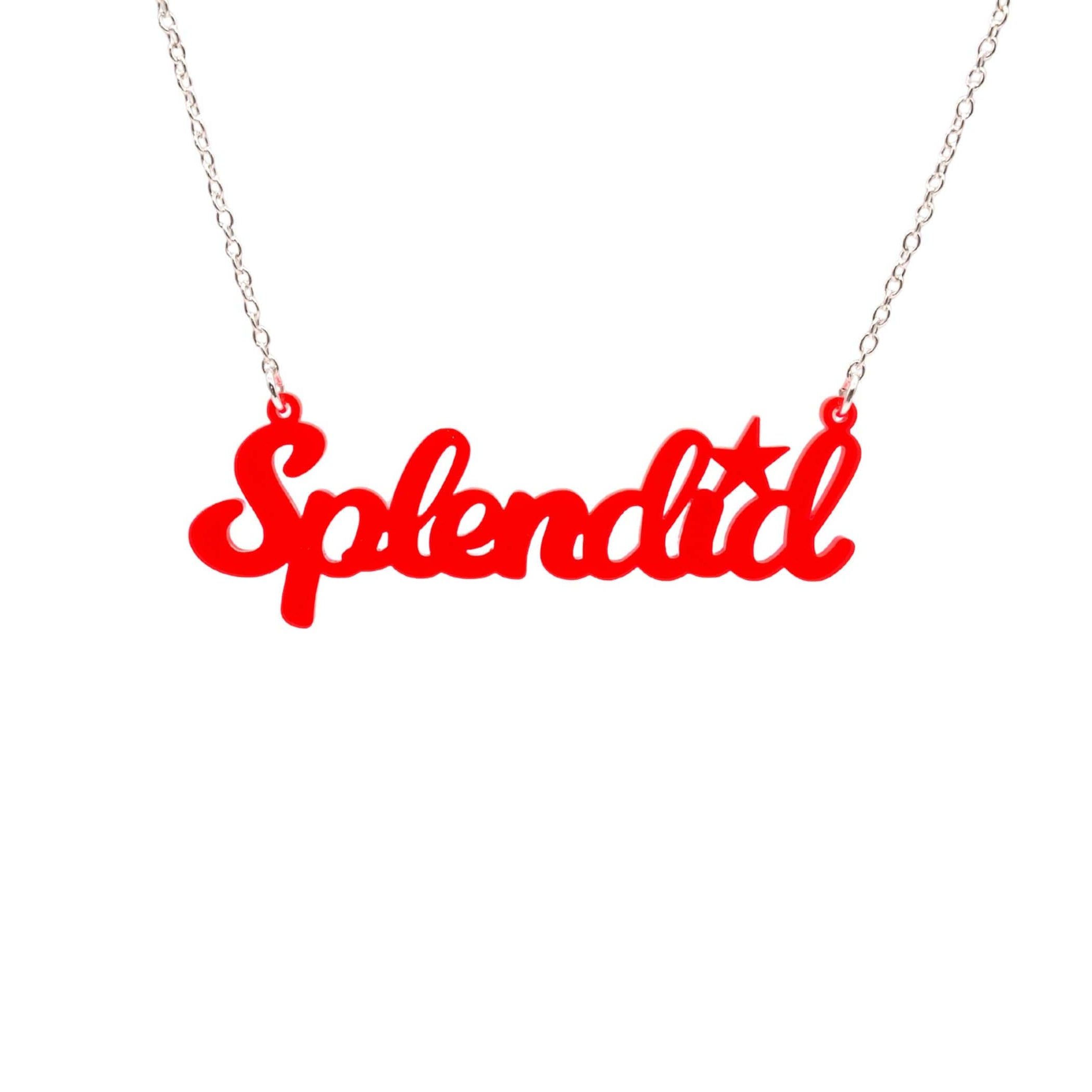 Splendid necklace in hot red shown hanging against a white background. 