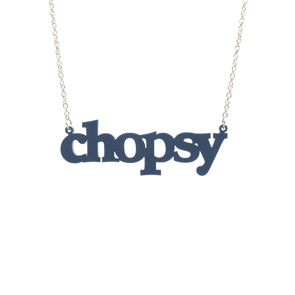 Welsh slate Chopsy necklace shown hanging against a white backround. 