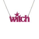 Hot pink glitter Witch necklace shown hanging on a stainless steel chain hanging against a white background. 