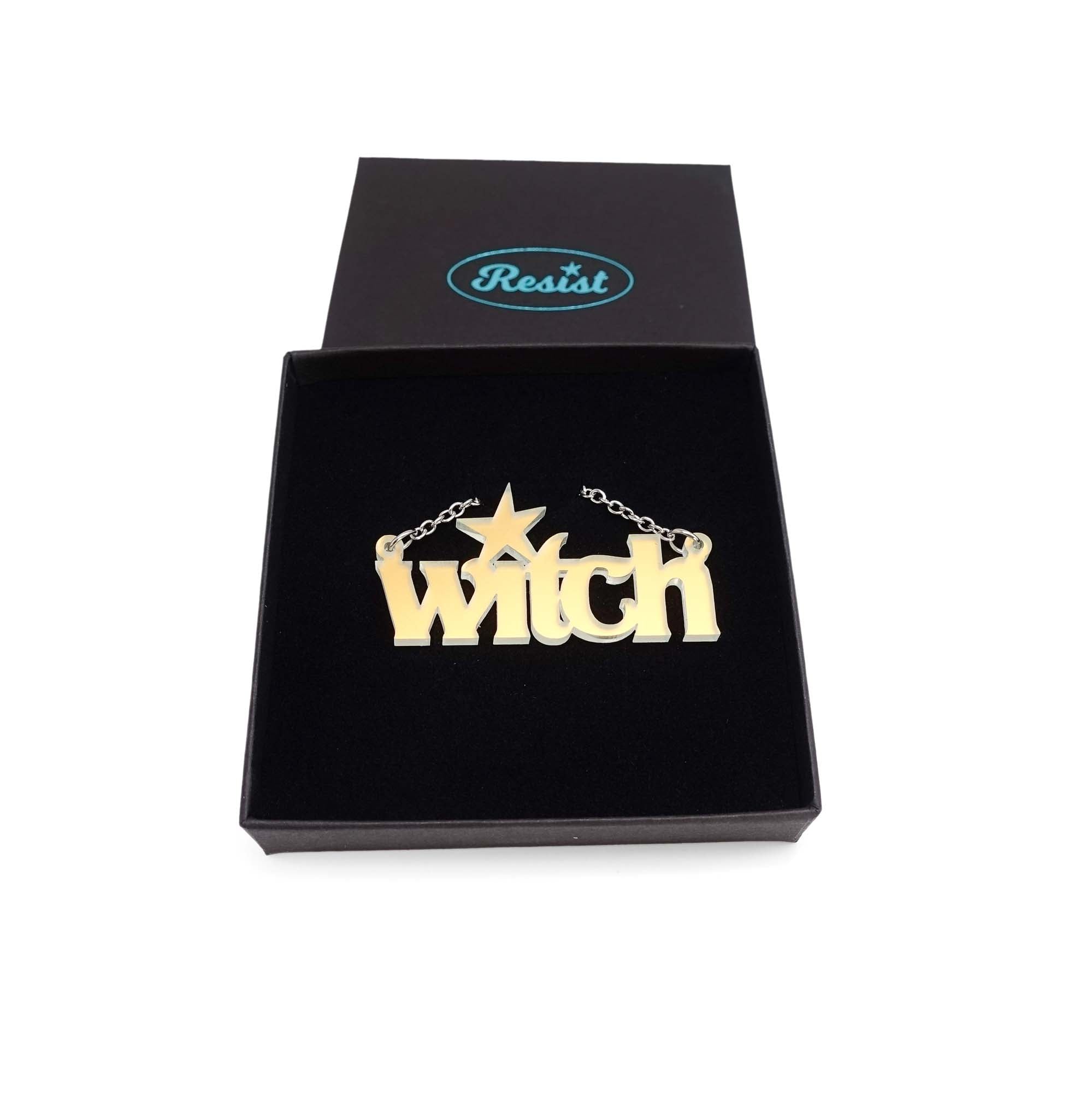 Witch necklace in matte iridescent shown in a Wear and Resist gift box. 
