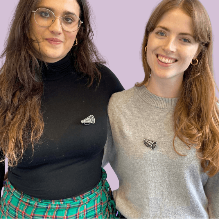 Members of Women for Refugee Women wearing the Refugees Welcome Megaphone brooch. 