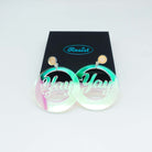 Yay earrings for celebrating in iridescent acrylic. Shown with a Wear and Resist gift box. 