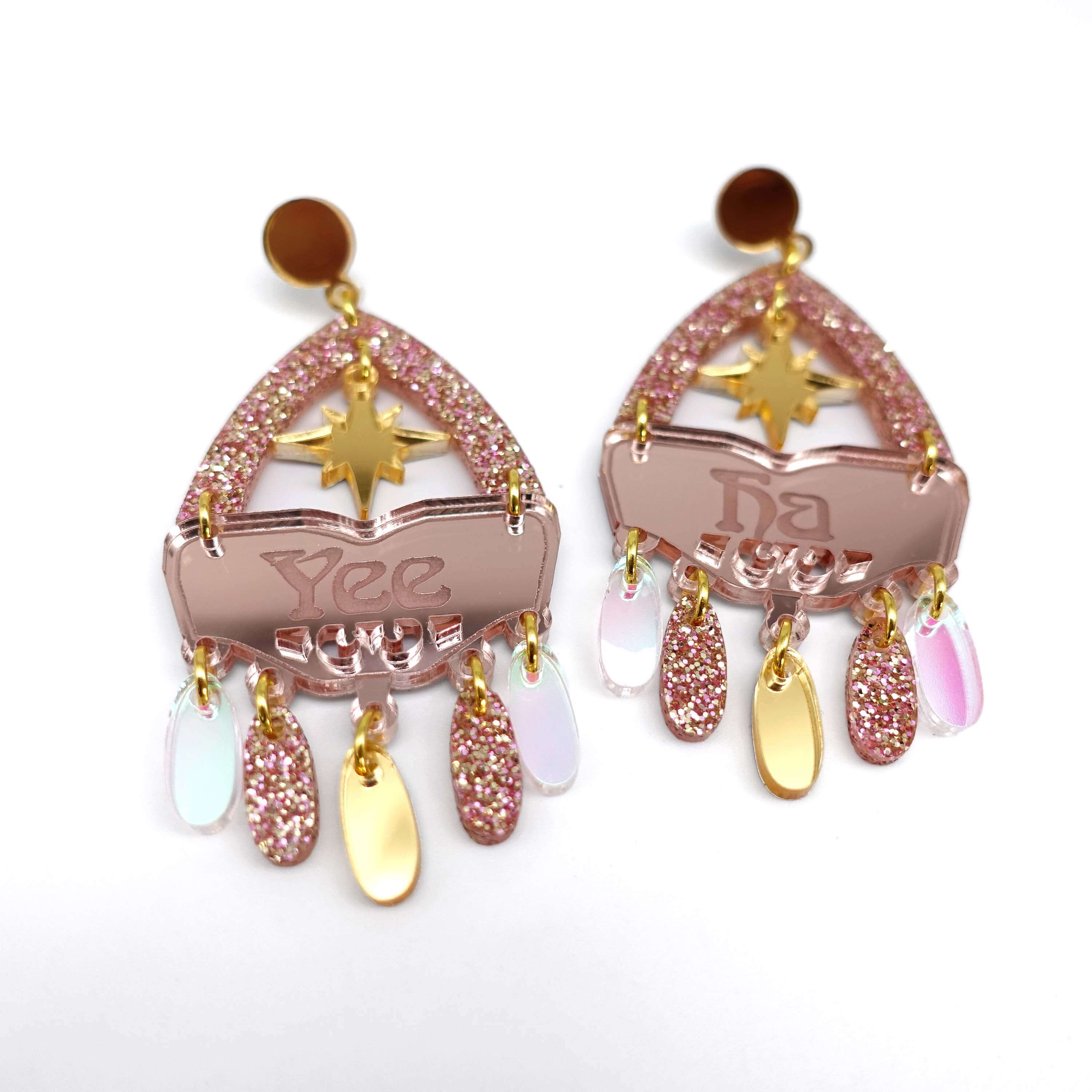Western style statement earrings in rosey gold colourway with the words Yee Ha engraved on rose gold pink and a gold star. 