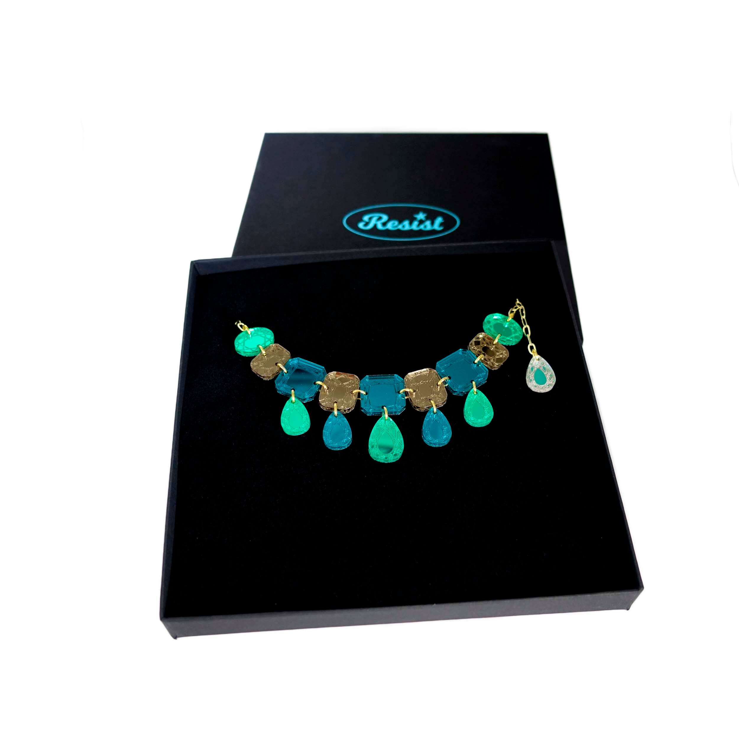 Austerity jewels necklace in teal époque colours, shown in a Wear and Resist gift box. 