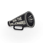 A matte black acrylic brooch in the shape of a megaphone, etched with glow in the dark paint with the words BIN THE BILLIONAIRES, shown on a white background.