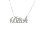 B*tch necklace in silver glitter shown hanging against a white background. 