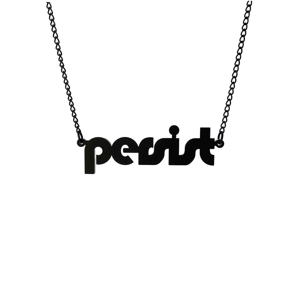 Matte black disco persist necklace shown hanging against a white background. 