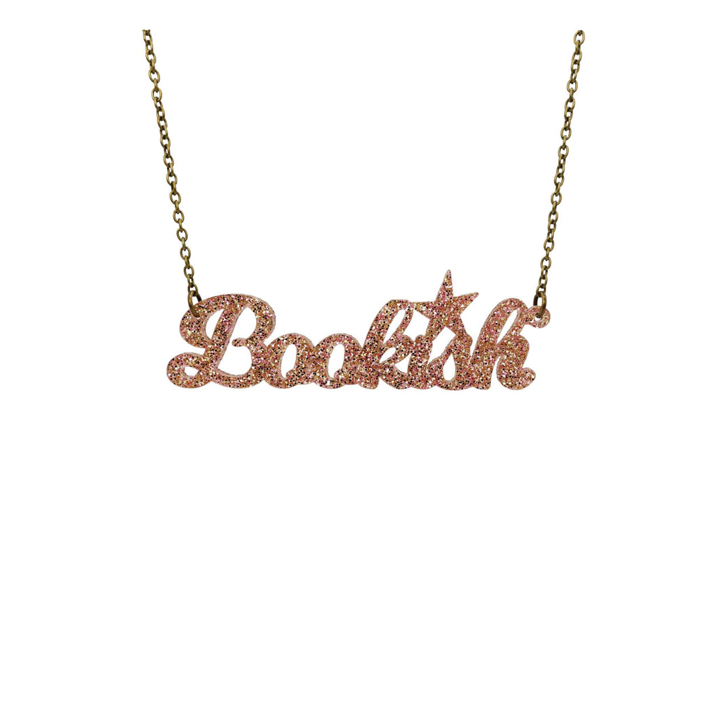 Bookish necklace in pink fizz glitter, shown hanging against a white background.