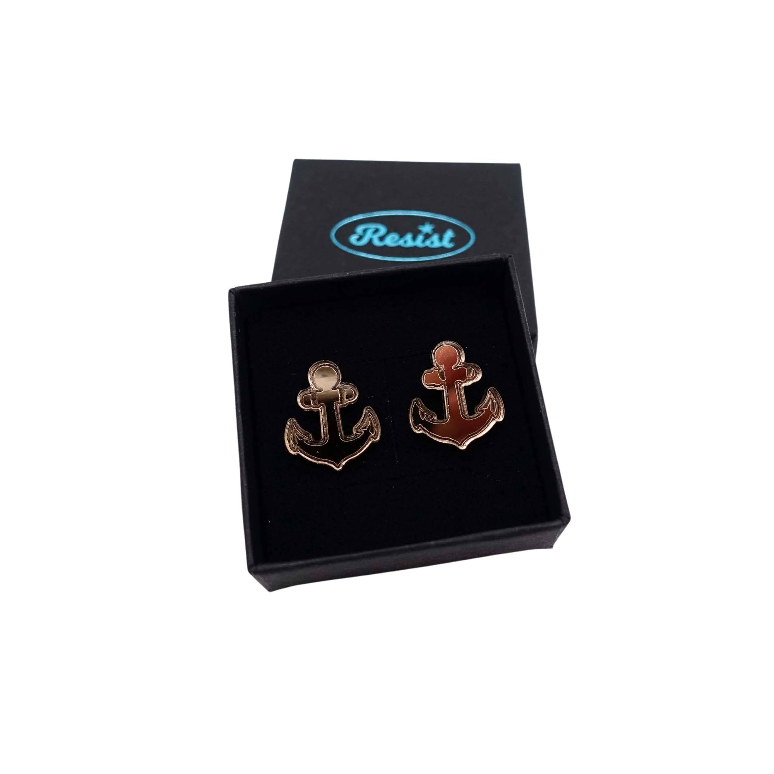 Bronze mirror little anchor earrings shown in a Wear and Resist gift box. 