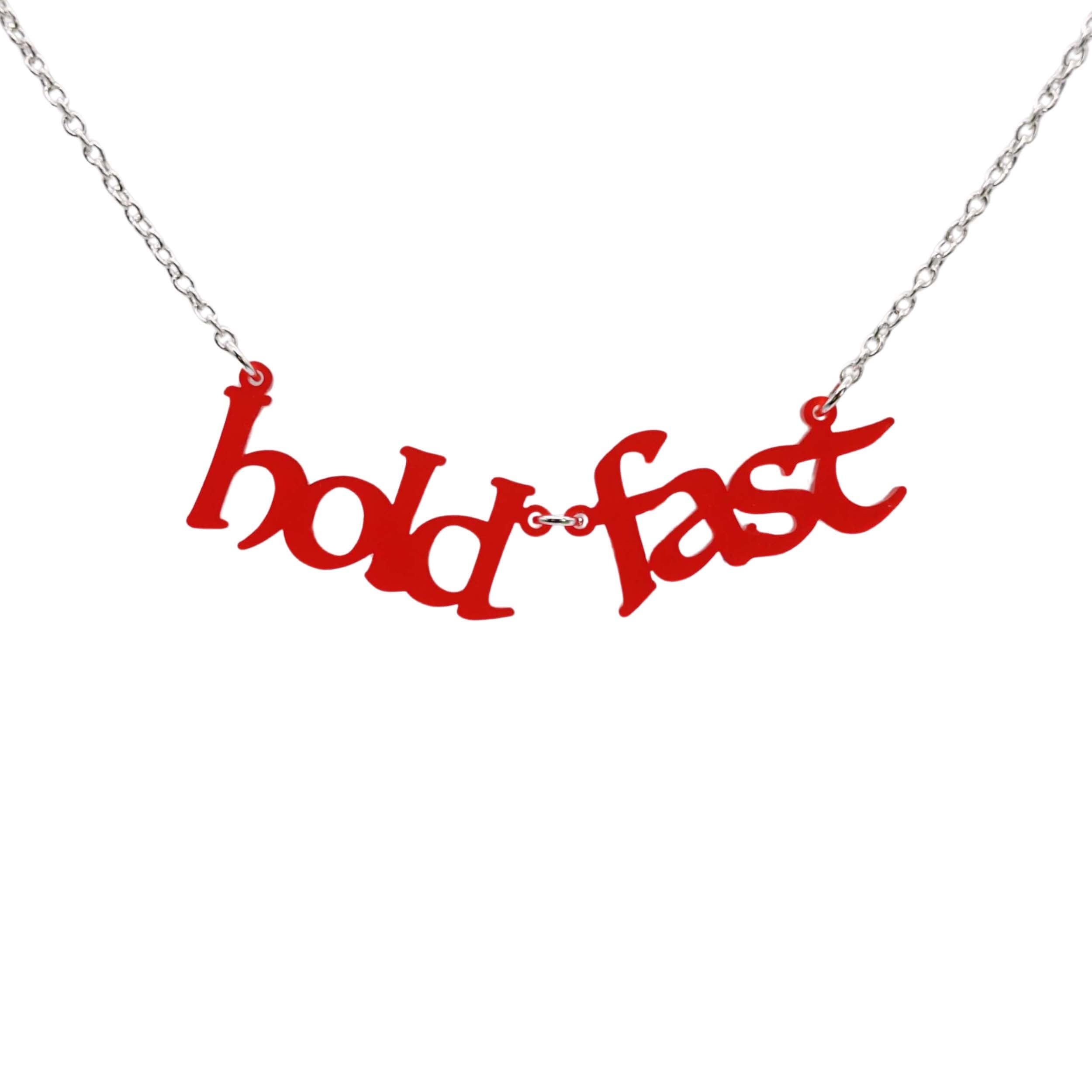 Chilli red frost Hold Fast necklace shown hanging against a white backround. 