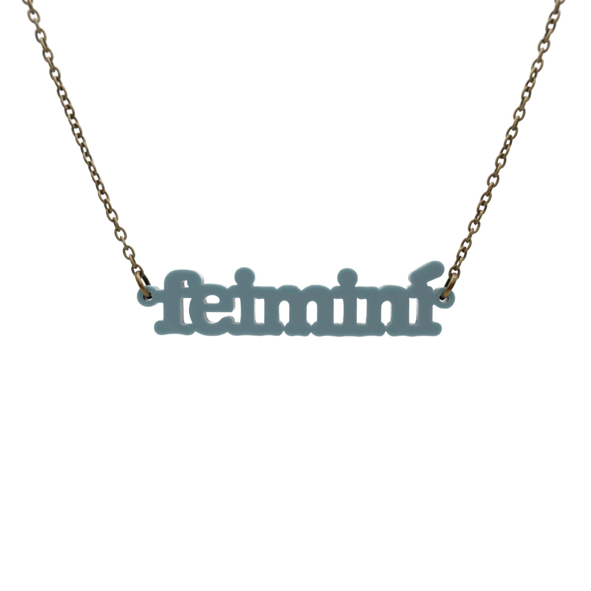 Irish Gaelic Feiminí necklace in duck egg green, shown hanging against a white background. 