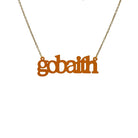 Gobaith Welsh hope necklace in cider frost shown hanging on an antique gold chain. 