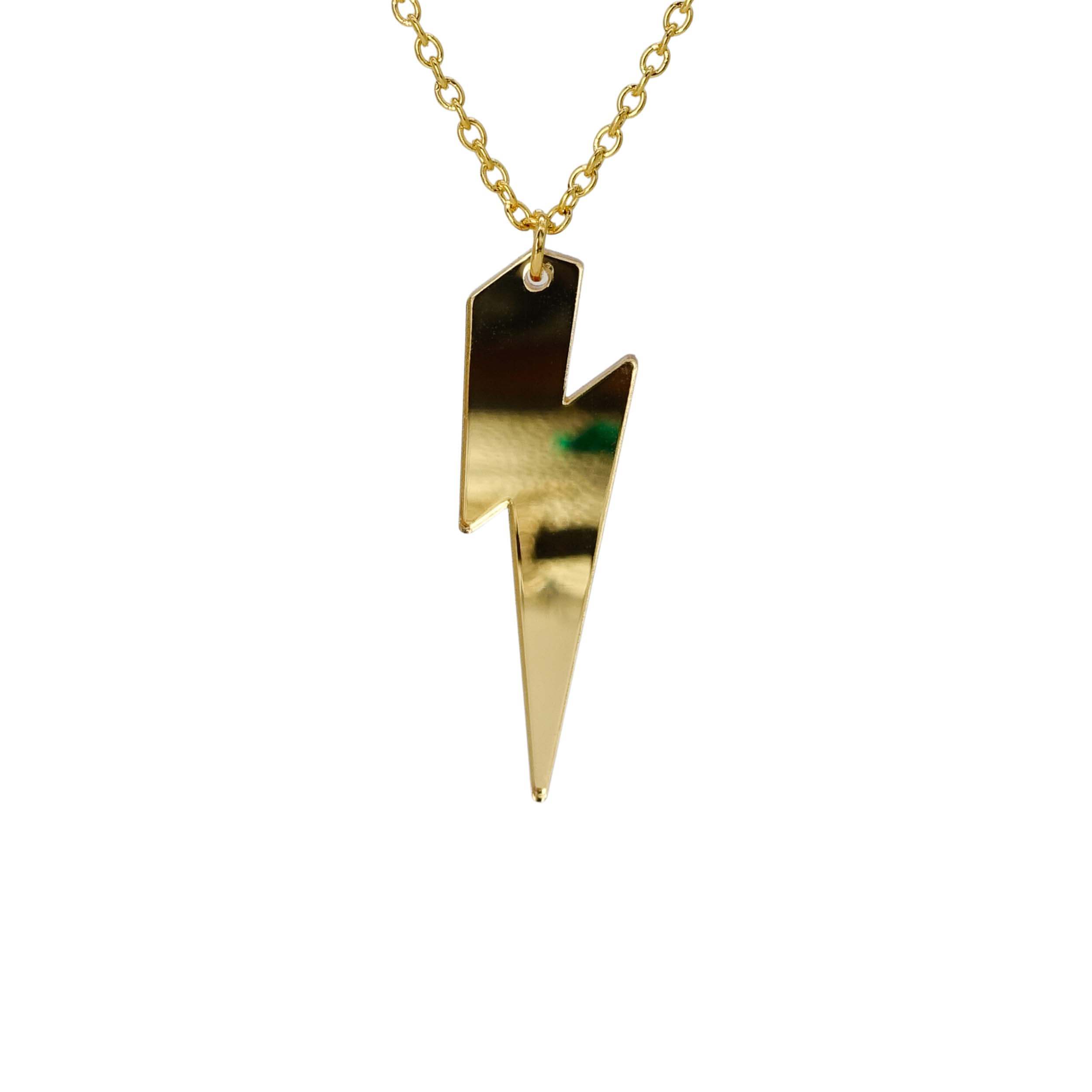 Gold mirror Lightning Bolt necklace shown hanging against a white background. 