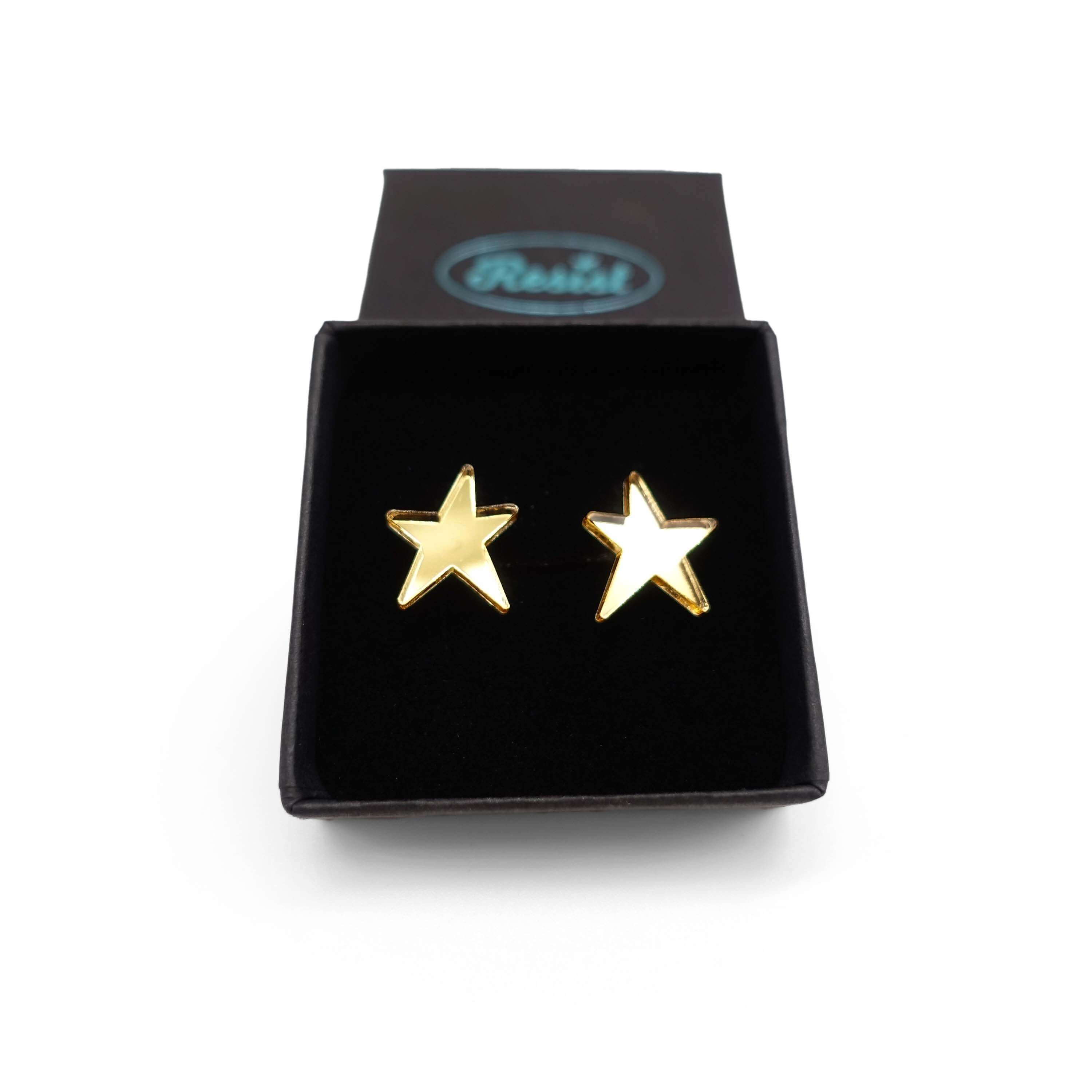 Gold green mirror funky Resist star earrings shown in a Wear and Resist gift box. 