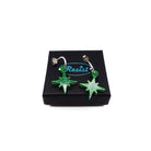 Green glitter limited edition Festive Vintage Star earrings, shown on a Wear and Resist gift box.  