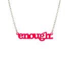 Hot pink Enough necklace shown hanging on a silver chain against a white background. 