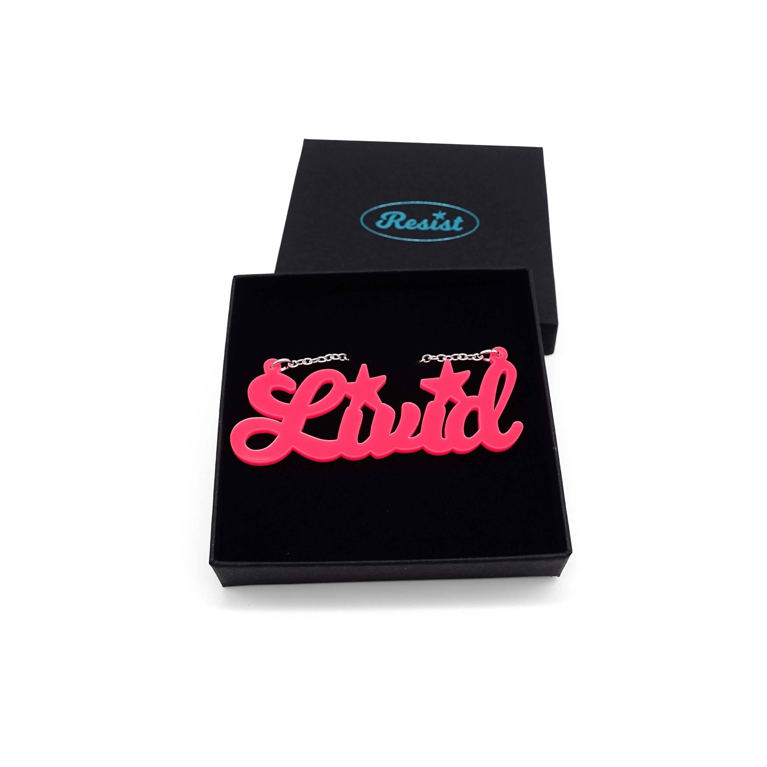 Livid necklace in hot pink, shown in a Wear and Resist gift box. 