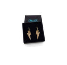 Lightning bolt hoop earrings in gold glitter in a Wear and Resist gift box. 
