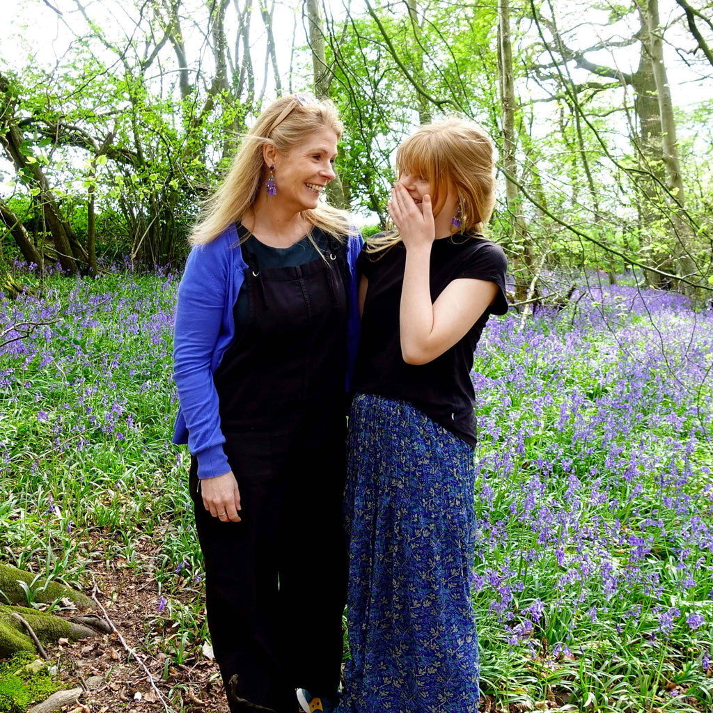 Sarah Day and her daughter, Eliza Day, standing in the Bluebells after a modelling session for the bluebell earrings. 