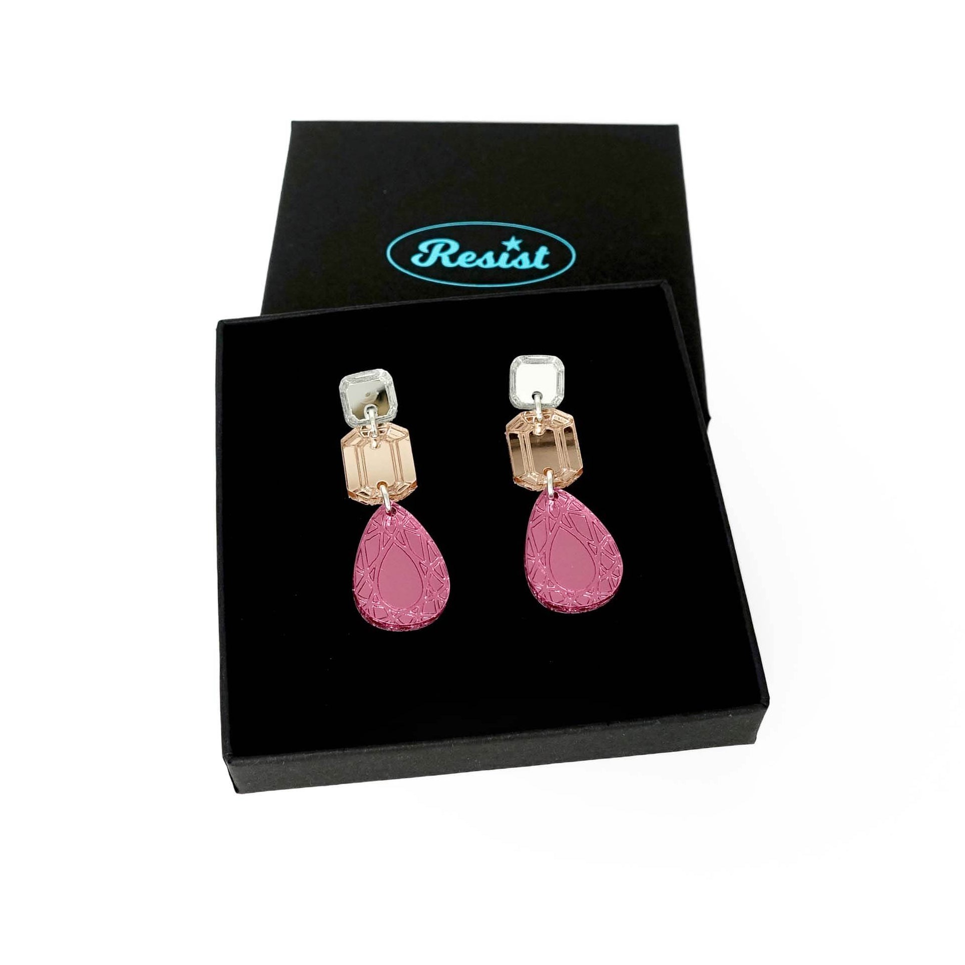 Medium Belle Epoque jewel earrings in pink shown in a Wear and Resist gift box. 