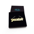 Typewriter Resist necklace in matte iridescent shown in a Wear and Resist gift box.