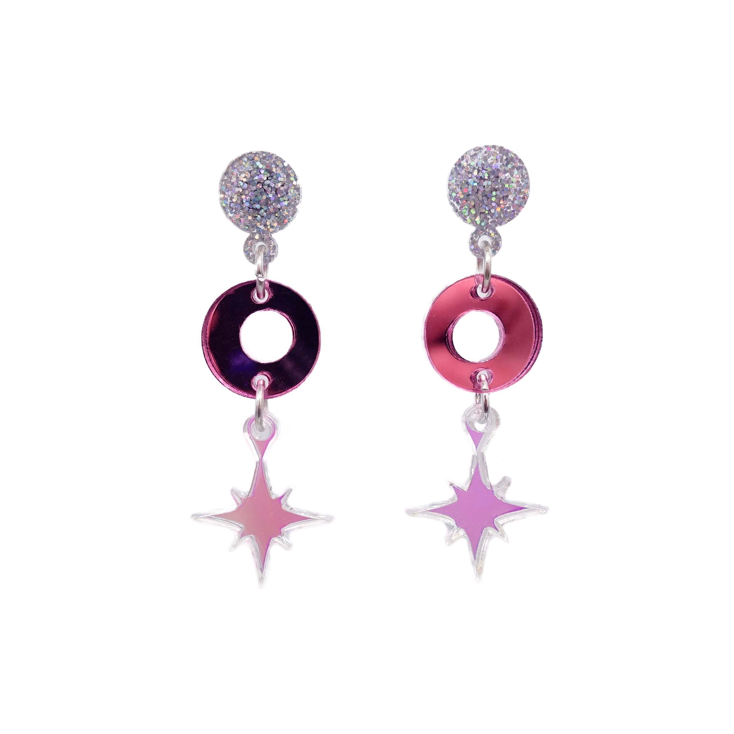 Pink and iridescent Deco Star earrings shown on white background. 