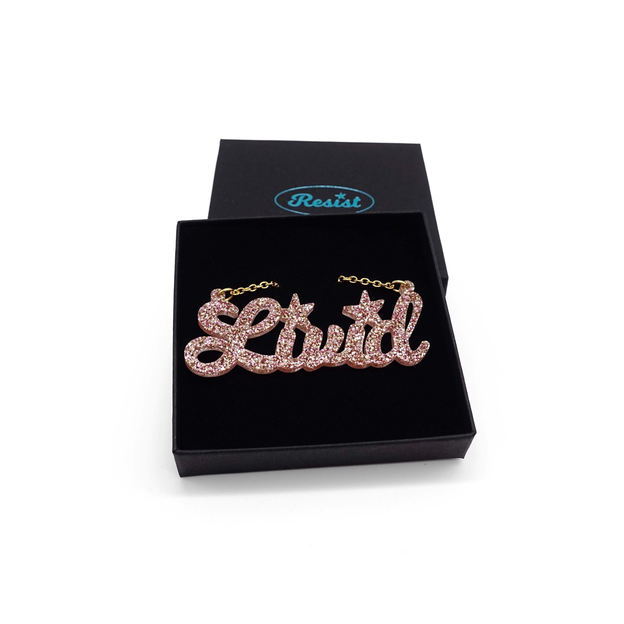 Livid necklace in pink fizz glitter, shown in a Wear and Resist gift box. 