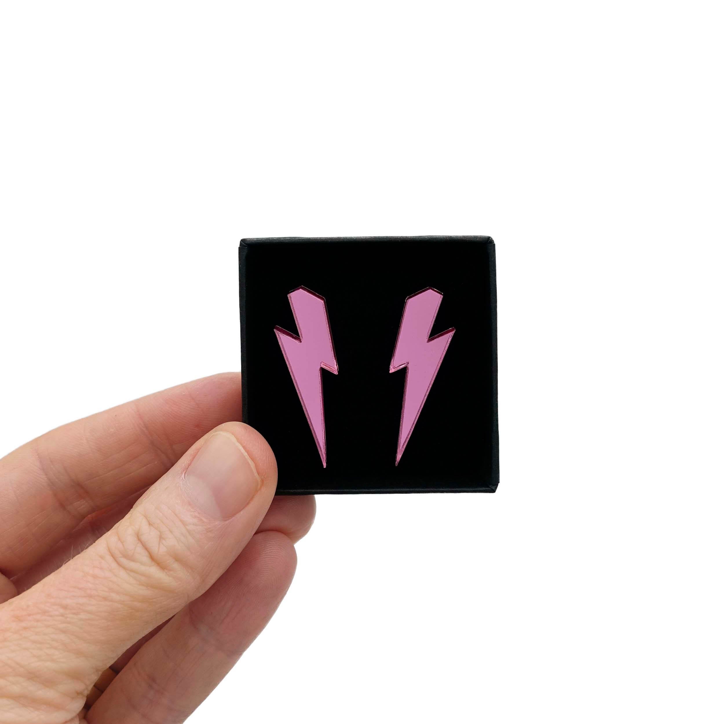 Medium lightning bolt earrings in pink mirror. 