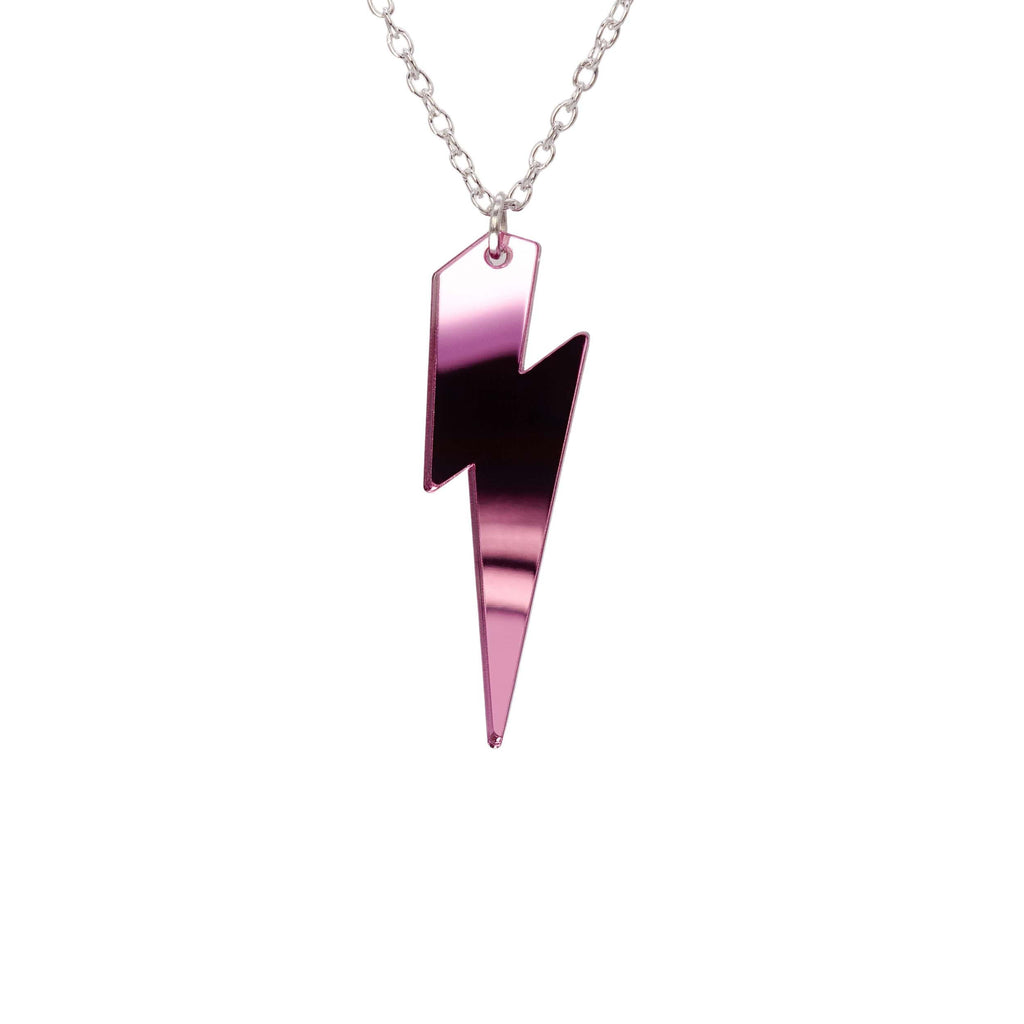 Pink mirror Lightning Bolt necklace shown hanging against a white background. 