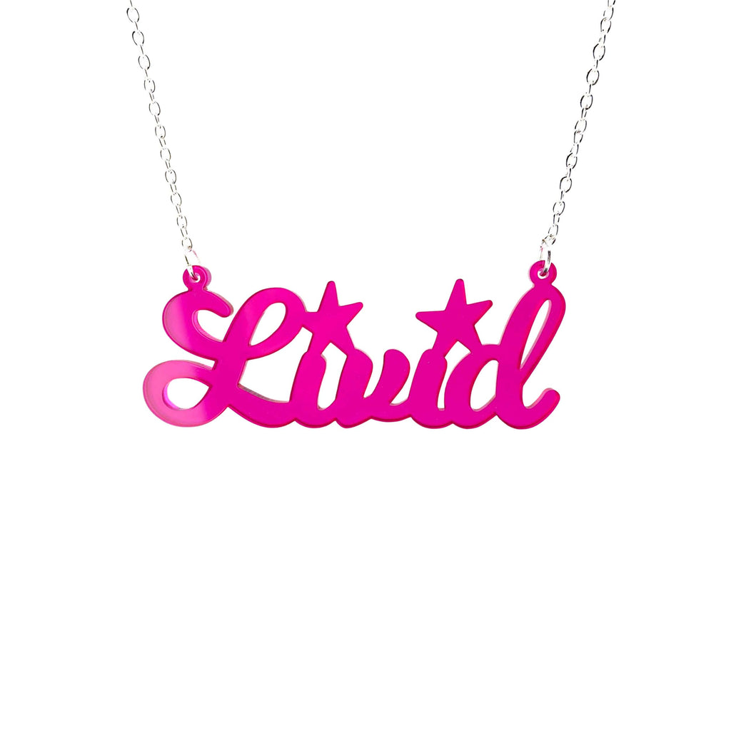 Livid necklace in clear hot pink shown hanging on a white background. 