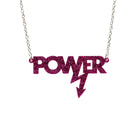 Purple glitter large Power necklace, designed in collaboration with Mary Beard to celebrate her book, Women & Power. 